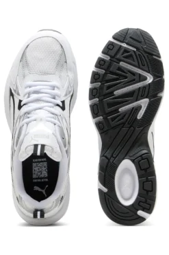 Sneakers bianche e nere stile running Puma Milenio tech
