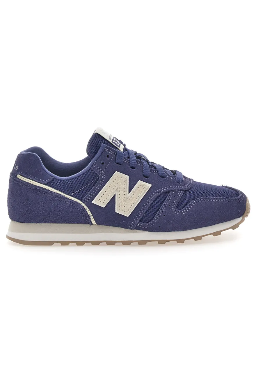 Sneakers blu con tomaia in pelle New Balance 373
